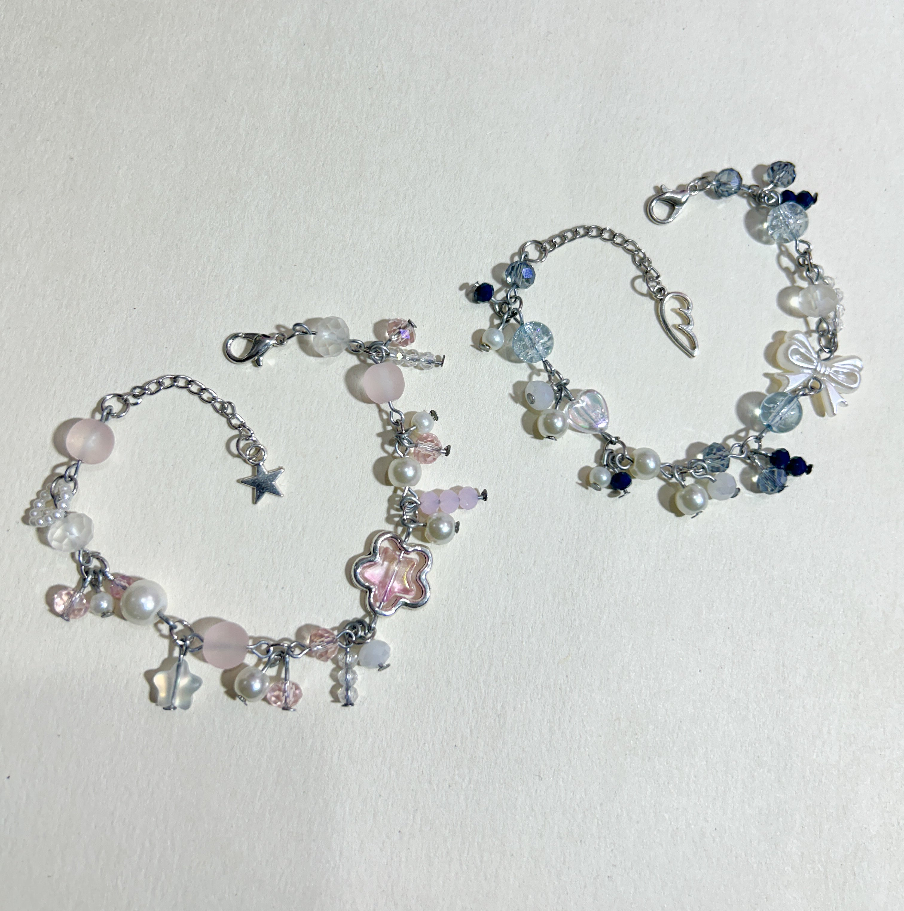 ICY BLUE & PASTEL PINK CLUTTERED CHARMS BRACELET